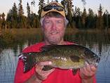 Ontario_fly-in_Bass_Fishing - Treelined_Lake